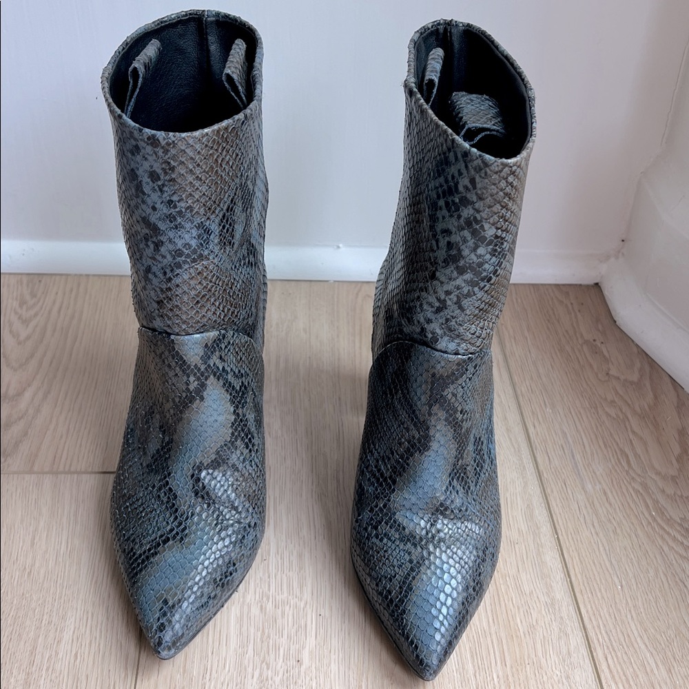 Anthropologie snakeskin embossed boots. Size 39 Great Condition and sold out!